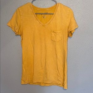 Yellow v-neck shirt